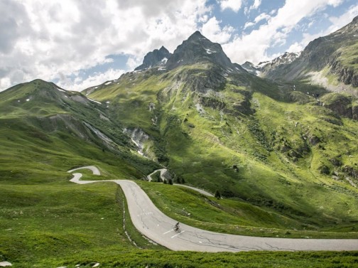 Cyclist on French Alps backroad